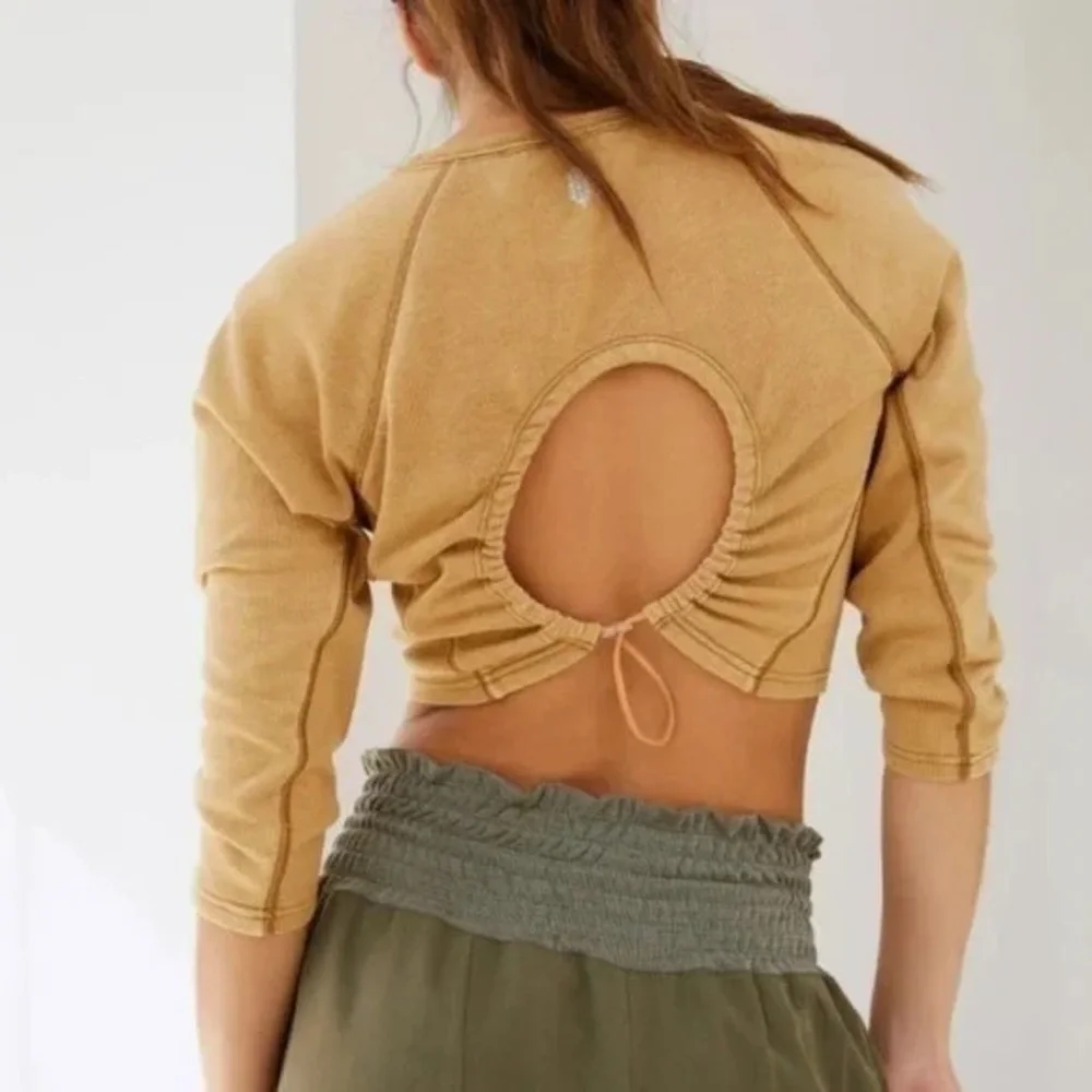 Free People movement Open Circle Back Tee Large NWOT